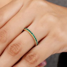 Product Details We know how Jewelry works charm for all our lovely ladies out there and so we bring this Gorgeous Eternity Ring for all our ladies who never go out of style. This Emerald Eternity Ring with Beaded Bezel Details is a must have Eternity Ring for all those special occasions, be it your Engagement, or a beautiful Valentine date night, this gemstone Ring will definitely charm everything up, so grab it now. Product Information SKU SHP-RINGS042165859 Width 1.8 mm Height 2.4 mm Weight 2. Emerald Eternity Band Gift, Emerald Green Eternity Ring, Green Emerald Eternity Band Round Shape, Green Eternity Band For Anniversary, May Birthstone, Green Emerald Ring, Half Eternity, Gift, Valentine Date, Emerald Eternity Ring, Half Bezel Setting, Half Bezel