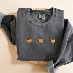 Cozy up with our Comfort Colors Pumpkin Crewneck Sweatshirt this fall season! This makes the perfect sweatshirt to lounge this fall and halloween season.  - Our sweatshirt material is super soft and high quality! ♡ - Garment-Dyed Sweatshirt (Sustainable style)  - 80% cotton, 20% polyester - All our sweatshirts run a UNISEX fit. (Both for men and women) They fit true to size. But if you like a more baggy look, we highly recommend sizing up. - These letters are embroidered iron-on patches that have been heat pressed, not embroidered. Rest assured, they'll be fully in tact after wash.  Please be mindful that we do not accept RETURNS / EXCHANGE / ORDER CANCELLATIONS in any way because this is made to order. We are also open for wholesale/bulk orders, kindly send us a message! Handmade in Chica Cozy Crew Neck Tops For Fall, Cozy Orange Crew Neck Top, Soft-washed Sweatshirt For Fall Loungewear, Gray Crew Neck Sweatshirt For Fall, Soft-washed Sweater For Fall, Soft-washed Fall Sweater, Cozy Crew Sweatshirt For Fall, Cozy Crew Neck Sweatshirt For Fall, Soft-washed Crew Neck Top For Fall