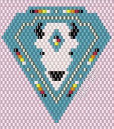 a cross stitch pattern with a blue diamond on the front and bottom half of it