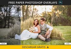 a couple sitting on the ground in front of some trees and bushes with their wedding photos taken