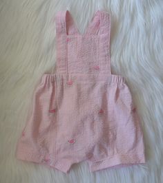 Are you looking for the sweetest addition to your little girl's closet? This watermelon printed seersucker romper would make the perfect romper for your littles spring or summer wardrobe. Make with cotton seersucker, it is lightweight and breathable. It has adjustable straps and an elastic waistband to make for the perfect fit.  -100% cotton seersucker Pattern by OhMeOhMySewing Playful Pink Diaper Cover For Summer, Sweet Pink Summer Onesie, Summer Pink Cotton Diaper Cover, Spring Playwear Pink Diaper Cover, Summer Pink Printed Onesie, Easter Romper, Spring Rompers, Toddler Girl Romper, Pink Watermelon