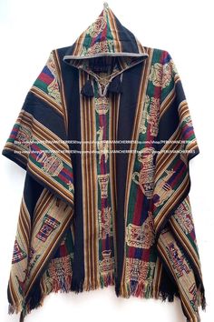 "Our traditional poncho has been made with the quality and rustic appereance of the natural Alpaca and designed in a very particular and nice style. Its an original versatile garment from the andes of Peru! MATERIAL: Alpaca Wool. Alpaca Wool is hypoallergenic, light and warm. Its fibers contain microscopic air bags that make the garments light and delicate while acting as excellent insulators. WARM & SOFT: It will surely keep you warm on cold winter days. You will find that the materials really Bohemian Black Handwoven Poncho, Black Bohemian Handwoven Poncho, Traditional Black Cape For Festival, Traditional Black Festival Cape, Black Alpaca Shawl Poncho, Traditional Black Cape For Fall, Traditional Black One-size Poncho, Peruvian Poncho, Alpaca Poncho