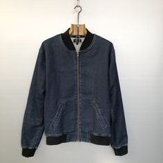 Beautiful vintage Agnès B bomber jacket. Dark blue jean fabric, light gray lining. Black rib knit cuffs and bottom band. A very cool classic piece, a must have! Material is denim made of 93% cotton, 6% polyester and 1% elastane -- Rib knit cuffs and bottom band are 100% cotton Condition is : very very good vintage condition -- probably never worn, the pockets are still sewn Size is men S/M (refer to measurements) Do not hesitate to DM if you have any questions ! shoulder seam to shoulder seam : Casual Varsity Jacket With Ribbed Cuffs For Spring, Casual Varsity Jacket With Zipper For Spring, Urban Cotton Varsity Jacket For Spring, Casual Cotton Varsity Jacket With Striped Cuffs, Casual Cotton Outerwear With Contrast Collar, Cotton Outerwear With Striped Cuffs For Streetwear, Casual Cotton Outerwear With Striped Cuffs, Winter Cotton Outerwear With Striped Cuffs, Urban Cotton Denim Jacket With Zipper