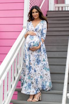 A maternity baby shower dress for stylish moms-to-be! A floral printed, maternity maxi dress with a wrap v-neckline, a sash tie, and 3/4 sleeves. Dress is double lined to prevent sheerness. The PinkBlush Ivory Floral Sash Tie Maternity/Nursing Maxi Dress is perfectly bump-friendly! Floral Pregnancy Dress, Pregnancy Dress Outfits, Dress For Baby Shower, Maternity Fashion Dresses, Nursing Maxi Dress, Pregnant Dress, Dress For Pregnant Women, Maternity Dress Outfits, Pregnancy Dresses