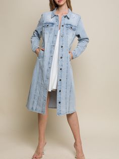 "Multiple Styling, Wear it as a Dress or wear it as a Coat Denim Trench Coat Features Distressed Fabric with Retro Vintage Style Long Jean Jacket can be Used as Midi Dress. Length Below Knees. All Seasons Jacket. It has some stretch. Available in Blue and Light Blue from Size Small to Large NO REFUNDS-please check sizing Small (2/4), Medium (6/8), Large (10) Model is Wearing Size Small. Model: 5'9\"  32C bust, 25\" waist, and 36\" hips.  Self: 98% Cotton 2% Spandex Perfect, Soft Cozy top to wear Fall Light Wash Denim Dress With Buttons, Spring Outerwear With Buttoned Pockets, Light Wash Outerwear With Buttoned Pockets For Spring, Spring Light Wash Outerwear With Buttoned Pockets, Light Wash Single Breasted Outerwear For Spring, Casual Knee-length Spring Outerwear, Spring Washed Button-up Denim Dress, Spring Washed Denim Button-up Dress, Spring Light Wash Single-breasted Outerwear