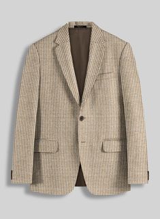 A suit elevates an office essential to the rarified realm of an everyday staple. Crafted from pure wool, our suit features a houndstooth pattern ideal for cold temperatures and brings some charm and fun loving spirit when you head on a cold, drizzly day. It will be a great addition and you will be glad to make it a part of your journey. A venturesome piece that will give you the best bold look and many styling options without exerting much effort.  Look Includes   Houndstooth Beige Tweed Fabric  Two Button Jacket Style  Notch Lapel  Horn Brown Buttons  Single Vent  Three Cuff Buttons  Two Welted Back Pockets on Trousers    Click 'Customize Now' to modify the look if needed.   Lining: Viscose; Dry Clean.