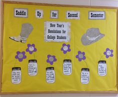 a bulletin board with mason jars and flowers