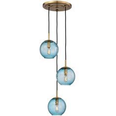 three blue glass globes hanging from a ceiling fixture