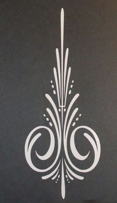 a black and white poster with an ornate design on the back of it's cover