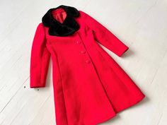 "Item details: - cherry red - black faux fur collar - feels like wool - buttons down front - pockets on hips - fitted shape - fully lined Best fits a size xs - small. Measurements: bust: 36\" waist: 33\" length: 40\" shoulder: 15.5\" sleeve: 23\" Excellent vintage condition." Red Fitted Collared Outerwear, Red Fitted Outerwear With Faux Fur Trim, Fitted Red Outerwear With Faux Fur Trim, Classic Fitted Outerwear With Faux Fur Lining, Fitted Red Wool Outerwear, Red Wool Coat, Black Faux Fur, Red Wool, Faux Fur Collar