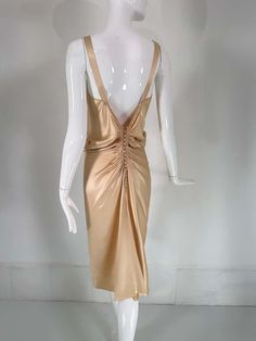 For Sale on 1stDibs - John Galliano, old Hollywood glamourous gold satin evening dress with a plunge V neckline and chiffon woven shirred center front, The back features a row Satin Evening Dress, Satin Evening Dresses, Gold Satin, John Galliano, Old Hollywood, Evening Dress, Evening Dresses, Chiffon, Hollywood