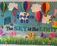 the sky is the limit bulletin board with paper hot air balloons and kites on it