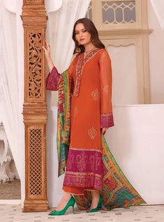 Orange Salwar Kameez Pakistani Eid Dress in Chiffon fabric is a traditional attire to wear on the big day. This beautiful Pakistani Dress is adorned with lavish embroideries and digital print, making it an epitome of beauty to have a head-turning appearance. Zainab Chottani, Salwar Kameez Pakistani, Eid Dress, Beautiful Pakistani Dresses, Eid Dresses, Chiffon Dupatta, Silk Trousers, Dyed Linen, Lawn Suits