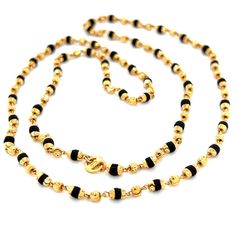 Purity Info will be here 22K Yellow Gold Weight 12.37 Gm Dimension: 24in L Product detail: Product Code: TULS-6701030 Color: Yellow Gold Product Type: Necklace Age Group: Adult Gender: Unisex Availability: In Stock Country Of Origin: India Product description: Beautiful tulsi mala with 57 beads and measures 24 inches in length. Necklace features authentic tulsi beads capped with gold and sparkly gold beads. No necklace closure. Beads measure 3mm in width. Tulsi bead weight is 0.78g. JWtUh7WgswY Tulsi Mala, Necklace Closure, Gold Filigree Earrings, Length Necklace, Filigree Earrings, Gold Filigree, Gold Earrings Dangle, Bead Caps, 22k Gold