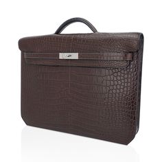 Guaranteed authentic Hermes coveted Kelly Depeches 36 briefcase bag featured in Matte Havane Porosus Crocodile.Laptop compartment and a rear interior wall zip pocket.Accentuated with Palladium hardware.Comes with sleeper and signature Hermes box.NEW or NEVER WORN.final saleBRIEFCASE MEASURES:LENGTH 36.6 cm / 14.4"TALL 29 cm / 11.41"DEEP 5 cm / 1.97"CONDITION:NEW or NEVER WORN TIDS 'n BITSThis new Kelly Depeches documents holder has sleek clean lines with beveled corners harkens to the constructi Luxury Leather Bag With Rectangular Case, Luxury Rectangular Case Shoulder Bag, Luxury High-end Rectangular Box Bag, Luxury Textured Leather Briefcase, Timeless Business Bag With Crocodile Pattern, Classic Crocodile Pattern Satchel, Timeless Crocodile Pattern Business Bag, High-end Business Bag With Crocodile Pattern, Luxury Satchel Cases For Formal Occasions