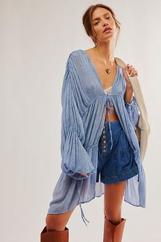 Chic Spring Layering Cover-up, Summer Tops With Gathered Sleeves And Flowy Fit, Summer Flowy Top With Gathered Sleeves, Summer Tops With Gathered Sleeves, Flowy Fit, Bohemian Billowy Tops For Day Out, Long Sleeve Summer Layering Cover-up, Billowy Bohemian Tops For A Day Out, Breezy Long Sleeve Spring Cover-up, Spring Breezy Cover-up With Long Sleeves