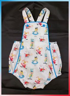 "Baby vintage-style romper/sun suit. Also available with ruffles added to the booty. Coordinating fabric (if applicable), trim, and/or buttons may vary from the romper pictured. The bib of the romper is lined. You may move the buttons on the straps of the romper to make the straps fit longer or shorter. HEADBAND BOW made from romper material is available for purchase for $5. Find the listing in this shop for \"BOW ADD-ON\" to purchase. SIBLING OUTFIT made to match rompers is available for purcha Cute White Printed Bubble Romper, Playful White Bubble Romper With Cartoon Print, Playful White Printed Bubble Romper, White Sleeveless Printed Bubble Romper, White Printed Sleeveless Bubble Romper, White Cotton Bubble Romper With Cartoon Print, White Playful Fitted Bubble Romper, Playful Fitted White Bubble Romper, White Fun Bubble Romper For Playwear