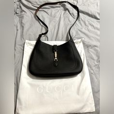 Black Leather Bag, Purchased Last Week Looking To Sell. Brand New. Only Taken Out Of The Box To Take A Pic For The Listing. Never Used. Modern Black Shoulder Bag With Horsebit Detail, Gucci Black Crossbody Shoulder Bag, Black Gucci Crossbody Shoulder Bag, Gucci Black Crossbody Bag, Gucci Black Shoulder Bag, Classic Black Gucci Shoulder Bag, Gucci Shoulder Bag With Silver-tone Hardware For Office, Gucci Black Shoulder Bag For Business, Black Gucci Bag For Everyday Use