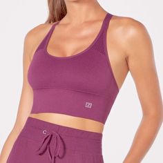 Ella Seamless Sports Bra In Potent Purple S *Nwt* The Seamless, Jacquard Design On This Sports Bra Feels Amazing, And Is Complemented By The Front Mesh Trim, A Longline Silhouette, And Strappy + Adjustable Back. Removable Cup Bands Low Impact 3” Underband Seam-Free Jacquard Design Adjustable Back Shoulder Straps Dry-Wik Finish Brand: Zobha Color: Potent Purple Size: Small **Brand New With Tags/ Ellie Subscription Only** Jacquard Design, Seamless Sports Bra, Back Shoulder, Long A Line, Shoulder Straps, Women's Intimates, Sports Bra, Mesh, Trim