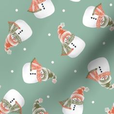 a green background with white and orange snowmen