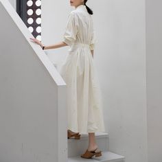 Chic White A-line Linen Dress, Elegant Solid Shirt Dress For Beach, Elegant Solid Color Shirt Dress For Beach, Daytime Midi Length Summer Shirt Dress, Chic White Shirt Dress For Summer, Chic White Summer Shirt Dress, White Chic Shirt Dress For Summer, White Midi Length Summer Shirt Dress, Cream Cotton Linen Dress For Summer