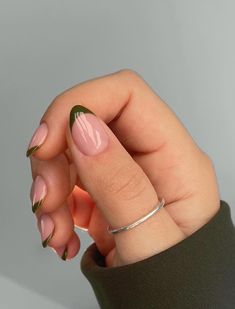 Looking for ideas for the perfect olive green nails? Check out these stunning olive green nail designs that are modern and chic. There's short and long olive nails, with coffin, almond, round, and square shapes, along with matte, shiny, French tip, or with gold foil, silver, and more! These nails are perfect for winter, spring, or fall! Classy Nails With Green, Olive Green French Tip Nails Coffin, Olive Green Design Nails, Olive Green Nails For Wedding, Olive Green Tips Nails, Olive Tip Nails, Olive Nails Almond, Olive Green Nails French Tip, Olive French Nails