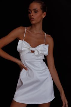 Shop the Lilly Bow Diamante Mini Dress White | Selfie Leslie Satin Dress With Sweetheart Neckline And Tie Back, Glamorous Tie-back Mini Dress For Prom, Glamorous Tie Back Mini Dress For Prom, Party Mini Dress With Sweetheart Neckline And Tie Back, Sweetheart Neckline Mini Dress With Tie Back For Party, Elegant Tie-back Mini Dress For Prom, Elegant Tie Back Mini Dress For Prom, Elegant Prom Mini Dress With Tie Back, Party Mini Dress With Bow Straps And Sweetheart Neckline