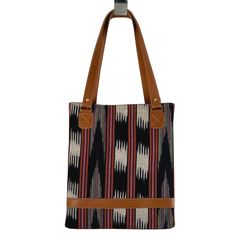 Looking for a uniquely gorgeous structured bag? Look no further! The jaspe (ikat) structured tote is made of handspun and handwoven fabric designed by the women of Ruk’U’X Keem of San Juan La Laguna, Guatemala. Cuero Malec, a Guatemalan leather shop, transforms the fabric into gorgeous, durable bags. Square Woven Bags For Everyday Use, Square Woven Bag For Everyday Use, Black Rectangular Shoulder Bag With Weaving, Artisan Black Handwoven Shoulder Bag, Leather Handwoven Shoulder Bag, Brown Weaving Shoulder Bag For Daily Use, Artisan Handwoven Shoulder Bag For Everyday, Artisan Shoulder Bag With Leather Handles For Market, Travel Tote Shoulder Bag With Weaving Work