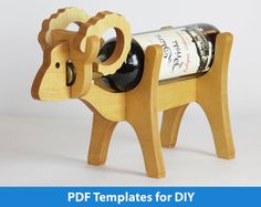 a wooden cow shaped wine bottle holder