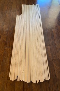 several pieces of wood laid out on the floor