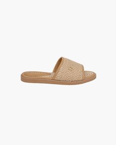 A women’s summer sandal for sale on line which is comfortable, lightweight and durable. This slip on casual style will literally coordinate with everything in your summer day wardrobe. The neutral ,”Peanut” shade row on row stitched raffia straw ,(Squishee®) on the vamp and padded footbed is the same one used for many Javits hats and bags. The generous vamp, designed to grab your foot, is lined with soft leather. The rubber bottom, 3/4” high at the heel and 1/2” in the front is lightly treaded f Natural Espadrilles With Textured Footbed For Vacation, Beige Flat Slides For Vacation, Lightweight Casual Vacation Slippers, Beach Slippers With Textured Sole, Comfortable Beach Slippers With Textured Sole, Comfortable Slippers With Textured Sole For Beach, Comfortable Espadrilles With Woven Sole For Vacation, Brown Slides With Woven Sole For Vacation, Vacation Slip-on Flip Flops With Textured Sole