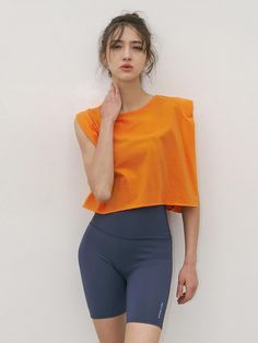 Composition : POLYESTER 85% + POLYURETHANE 15%Country of Origin : KOREA Orange Sleeveless Top For Athleisure, Orange Sleeveless Athleisure Top, Orange Sleeveless Workout Tops, Orange Sleeveless Top For Workout, Sleeveless Orange Activewear For Summer, Casual Orange Tank Top For Workout, Casual Orange Workout Tank Top, Orange Athleisure Short Sleeve Tops, Casual Workout Tops In Orange