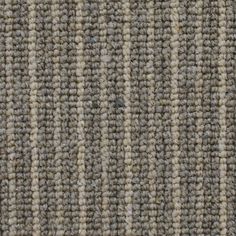 the texture of an upholstered carpet is shown in light brown and white colors