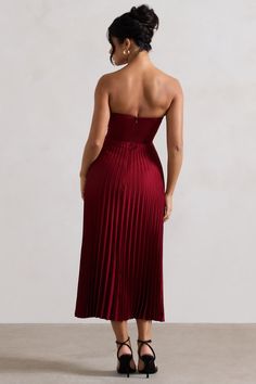 Encapsulate elegance in Bordeaux, our berry midi dress. This dress expertly cut in a premium satin creates a sophisticated feminine silhouette, with a sweetheart neckline and flattering structured corset bodice, the pleated skirt creates a romantic sense of movement. Style Bordeaux with our Hear Me court heels and a sleek bun for a classic look at your next occasion.  Features - Premium satin- Corset bodice- Sweetheart neckline - Strapless- Invisible zip closure - Pleated skirt- Midi length Sizing & Fit Model is 5'6 and wears UK size 8 / US size 4Product Information Designed exclusively by Club L London Unlined with no stretch Premium satin in Berry (100% Polyester) 125cm total length SKU: CL132315037 Structured Corset, Style Midi Dress, Sleek Bun, Black Dress Prom, Court Heels, Satin Corset, Corset Bodice, Party Dress Long Sleeve, Christmas Party Dress