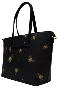 a black bag with gold bees on the front and side, it has a zippered closure