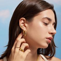 *Buy 2 items, Get 15% OFF your order. Coupon applied at checkout.* A pair of beautiful chunky hoop earrings. Make a statement and add sophistication to your outfit. Perfect for all occasions.    - Hypoallergenic - Thickness: 4.5 mm. - Diameter - 25 mm. - Made in 18k gold plated - 1 Year warranty All jewelry is handmade by hand and designed from Heart Made of Gold. GIFT WRAP AVAILABLE TO PURCHASE: https://www.etsy.com/listing/902780367/gift-wrap-for-gift-jewelry-pouch-jewelry?ref=shop_home_active Hypoallergenic Small Hoop Plug Earrings, Hoop Metal Cartilage Earrings, Everyday Single Hoop Plug Earring, Small Hoop Plug Earrings, Trendy Hoop Ear Cuff For Pierced Ears, Metal Hoop Ear Cuff, Small Hoop Plug Earrings With Ear Wire, Modern Hoop Cartilage Earrings, Small Hoop Ear Cuff With Ear Wire