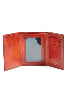 Richly burnished leather structures a spacious wallet with meticulous stitching. Style Name:Bosca 'Old Leather' Trifold Wallet. Style Number: 569392. Classic Trifold Card Holder With Smooth Grain, Classic Trifold Card Holder With Id Window, Classic Trifold Card Holder For Formal Occasions, Classic Formal Trifold Wallet With Card Slots, Classic Trifold Card Holder With Leather Lining, Classic Brown Trifold Card Holder, Classic Cognac Trifold Wallet With Coin Pocket, Classic Trifold Wallet With Smooth Grain, Leather Trifold Card Holder