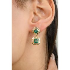 These stunning dangle earrings feature 3.24 carats of emerald and round-cut diamonds, elegantly paired in a two-stone design. The vibrant green emeralds are beautifully complemented by the sparkling diamonds, creating a harmonious blend of color and brilliance. Perfect for special occasions, these earrings exude timeless elegance and luxurious charm. Emerald enhances intellectual capacity of the person.  This is a perfect May Birthstone Jewelry also perfect Engagement Gift, Bridal Shower Gift, Girlfriend Gift, Gift For Sister, Mother Daughter Gift, Bride To Be Gift, Bridesmaid Gift, Valentine Gift, Wedding Gift, Anniversary Present, Engagement Gift, Gift for Her or any Holiday Gift for Mother, Sister, Daughter, Grandma, Fiancé, Girlfriend, Valentine, Family or Friend on your list.  PRODUCT Luxury Green Emerald Diamond Earrings, Classic Green Diamond Drop Earrings, Green Diamond Drop Earrings With Accents, Green Diamond Drop Earrings, Green Diamond Accented Drop Earrings, Green Diamond Accent Drop Earrings, Elegant Green Diamond Earrings, Green Drop Earrings With Diamond Accents, Green Emerald Cut Diamond Earrings For Formal Occasions