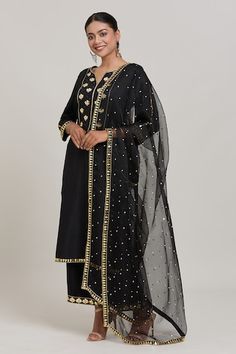 Black and gold acrylic kurta with a floral bead embroidered yoke, embroidered sleeves and hem. Paired with a pant and embroidered dupatta. - Aza Fashions Net Pattern, Style Trousers, Embroidered Border, Dupatta Set, Straight Kurta, Pattern Embroidery, Kurta With Pants, Kurta Set, Embroidered Silk