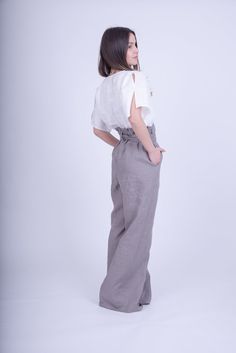 "ITEM DETAILS Comfortable vacational pants, wear with short shoes with top , tunic, t-shirt . Extremely comfortable for the free time or for sports. MATERIALS × cotton ------------------------------------------------------------------------------- Shop Policy Before ordering please check our shop policies https://www.etsy.com/shop/FloAtelier/policy?ref=shopinfo_policies_leftnav Every piece is made to order, turnaround time is 3-5 days. SEASON: All Seasons ---------------------------------------- Short Shoes, Loose Linen Pants, Model Legs, Black Harem Pants, Unisex Pants, Wool Trousers, Pants Casual, Loose Pants, Pants Wide Leg