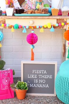 there is a sign that says fiesta like there is no manana on the table