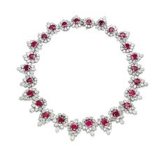 A RUBY AND DIAMOND NECKLACE, BY HARRY WINSTON Price realised CHF 269,000 Estimate CHF 120,000 - CHF 180,000 Closed: 11 Nov 2013 Harry Winston Jewelry, Coloured Diamonds, Jewellery Diamonds, Diamond Circle Necklace, Orange Diamond, Ruby And Diamond Necklace, Ruby Jewellery, Antiques Jewelry, Harry Winston