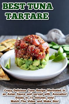 the best tuna tartare is served on a white plate with avocado