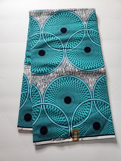 DESCRIPTION African Ankara Fabric. This is high quality African print is 100% cotton and it's 45 inches wide. It is used for making African Clothing, African quilts, & For Home decoration. FYI: Print is Double sided. The listing is for 6yards Each piece of fabric measures: 210-216in by 45in for 6yards If you purchase more than one yard, you will receive one continuous piece. *If you require more than what I have listed, feel free to send me email. CARE INSTRUCTIONS:•DO NOT BLEACH•Hand wash with cold water and mild soap or Dry clean•Press with warm iron on the wrong side only. Color may be different due to your monitor Cotton Digital Prints With All Over Pattern, Cotton Fabric With Traditional Pattern Prints, Traditional Patterned Cotton Prints, Cotton Fabric With Graphic Print, Patterned Cotton Fabric With Graphic Print, Printed Ankara Fabric In White, Blue Cotton Fabric With Traditional Patterns, Traditional Cotton Fabric With Geometric Pattern, Blue Ankara Fabric With Traditional Patterns