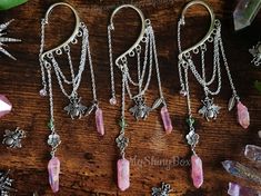 PRICE FOR 1 EAR WRAP! Crystal ear cuff with pink quartz crystal handmade by MyShinyBox. Each crystal is hand-selected and arranged with care and wire-wrapped with good intentions. The perfect gift for the crystal/gem lover in your life! My video instruction on HOW to wear my ear cuff (Insta Reel Video) https://bit.ly/3QkUp4Y See more of my ear cuffs and earrings - https://etsy.me/3SxnsEo If you would like a pair and two are not available, send me a message and I'll see if I can make a matching s Ear Wraps No Piercing, Handmade Pink Fairy Jewelry, Handmade Pink Fantasy Jewelry, Pink Bohemian Crystal Earrings For Pierced Ears, Bohemian Pink Crystal Earrings For Pierced Ears, Pink Bohemian Crystal Earrings, Pink Wire-wrapped Jewelry For Festival, Wire Wrapped Earrings Diy, How To Make Ear Cuffs