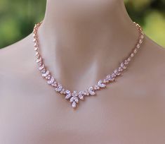 "Sparkling and elegant! Denise crystal necklace is in a tapering style which is extremely flattering and in a gentle V shape which suits the vast majority of dress necklines. Set in a tarnish free 16K rose gold base it is sure to be worn many times over when sparkliness is in order! Measures: L = 16.5\" (42 cm) + 1.5\" optional extender chain. THIS LISTING IS FOR NECKLACE ONLY* Highest quality cubic zircons set in tarnish resistant 16K rose gold for heirloom quality. Cadmium and nickel free. 💟 Rose Gold Jewelry Set, Gold Necklace Wedding, Gold Crystal Necklace, Rose Gold Wedding Jewelry, Gold Bridal Necklace, Crystal Wedding Jewelry, Wedding Necklaces, Gold Wedding Jewelry, Rose Gold Crystal