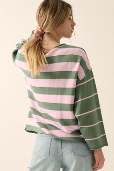 Striped knit sweater. Round neckline. Long sleeves. Drop shoulder. Rolled neckline, hem, and cuffs. Exposed seams. Loose fit. 50% Viscose, 28% Polyester, 22% Nylon. Imported. Designed in LA. Model wears size S. Striped Soft Knit Tops For Spring, Green Crew Neck Knit Top For Layering, Soft Knit Striped Tops For Spring, Green Tops With Ribbed Neckline For Fall, Spring Tops With Ribbed Cuffs, Spring Crew Neck Knit Top With Ribbed Cuffs, Oversized Cropped Sweater With Ribbed Neckline For Spring, Spring Long Sleeve Sweater With Ribbed Neckline, Spring Knit Long Sleeve Top