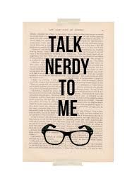 a book with the words talk nerdy to me written on it, and glasses