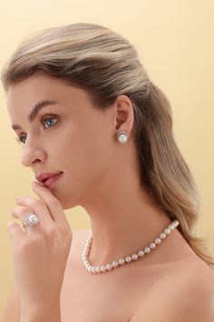 Treat yourself to timeless elegance with these 11-12mm Freshwater Pearl & Rose Floral Earrings from House of Pearls. Classically crafted from freshwater pearls, these earrings exude a classic charm that never goes out of style. The soft, rosy hue of the pearls gives them an added sense of allure, while the simple design keeps them versatile enough to wear it with almost any outfit. Perfect for casual or formal occasions, these timeless studs will add a hint of luxury to any ensemble. This popula Refined Round Pearl Earrings As Gift, Refined Round Pearl Earrings For Gift, Timeless Pearl White Pearl Earrings, Timeless Akoya Pearl White Pearl Earrings, Timeless Pearl White Earrings With Pearl Pendant, Classic Pearl White Jewelry With Matching Earrings, Timeless Pearl White Jewelry With Matching Earrings, Elegant Round Akoya Pearl Earrings, Timeless Pearl Jewelry With Matching Earrings