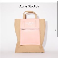 Acne Studios Brown/Pink Tote Bag Is Made Of A Nylon Fabric With A Papery Texture And Features A Detachable Crossbody Strap. Worn A Handful Of Times! Beautiful Bag. Short Handles Detachable Crossbody Strap Silver-Tone Hardware Exterior Leather Pocket With Logo Stamp Nylon With Papery Texture Style Id: Fn-Ux-Bags000047 Main Material: 100% Nylon Modern Pink Shoulder Bag With Logo, Functional Pink Leather Bags, Pink Double Handle Shoulder Bag With Logo, Functional Pink Shopping Bags, Functional Pink Bags With Detachable Strap, Pink Leather Bag With Logo, Functional Pink Bag With Detachable Strap, Designer Pink Bag With Logo, Pink Canvas Bag For Errands